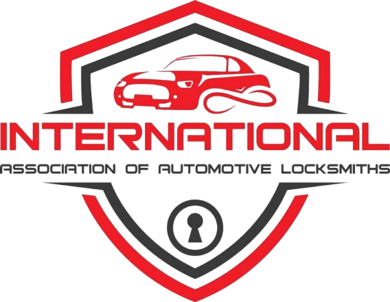Logo of the International Association of Automotive Locksmiths, featuring a red and black shield with a stylized car at the top, bold red text reading 'INTERNATIONAL,' and a keyhole symbol at the bottom.