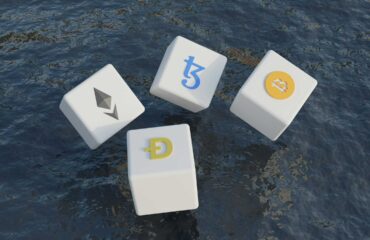 a group of white dice with different symbols floating on water
