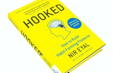 Hooked by Nir Eyal a yellow book with black text