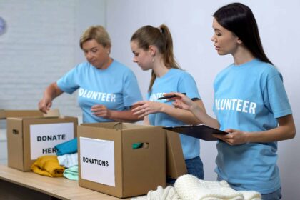 a group of women in blue t-shirts