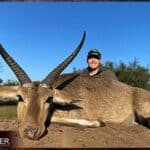 Common Reedbuck Hunting - About Hunting Reedbuck 12 Client with a Common Reedbuck on a plains game hunt in South Africa..