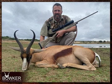 Plains Game Hunting in Africa - Hunt Plains Game with Nick Bowker 55 Client with a copper springbok shot while on an African hunting trip.