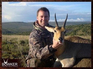 Plains Game Hunting in Africa - Hunt Plains Game with Nick Bowker 41 Client with a Mountain Reedbuck on a rocky ledge shot after a long walk and stalk.