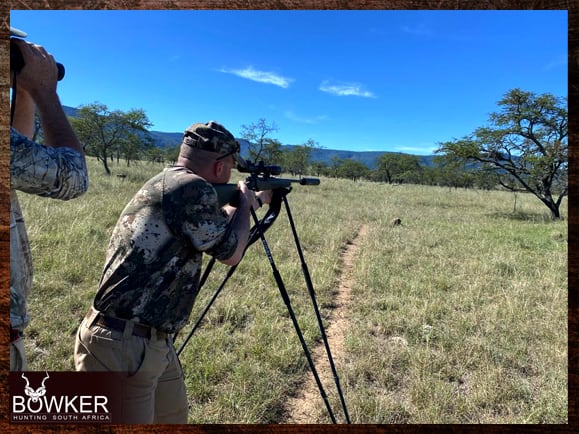 First-Time African Hunter - Plan Your Hunting Trip 4 Client using shooting sticks while hunting in South Africa