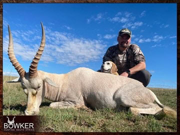 Plains Game Hunting in Africa - Hunt Plains Game with Nick Bowker 63 Client with a white blesbok on a plains animal hunt in South Africa.