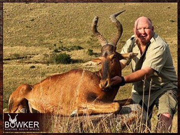 Gemsbok trophies are included in a number of our hunting packages. Client with a Red Hartebeest shot with Nick Bowker.
