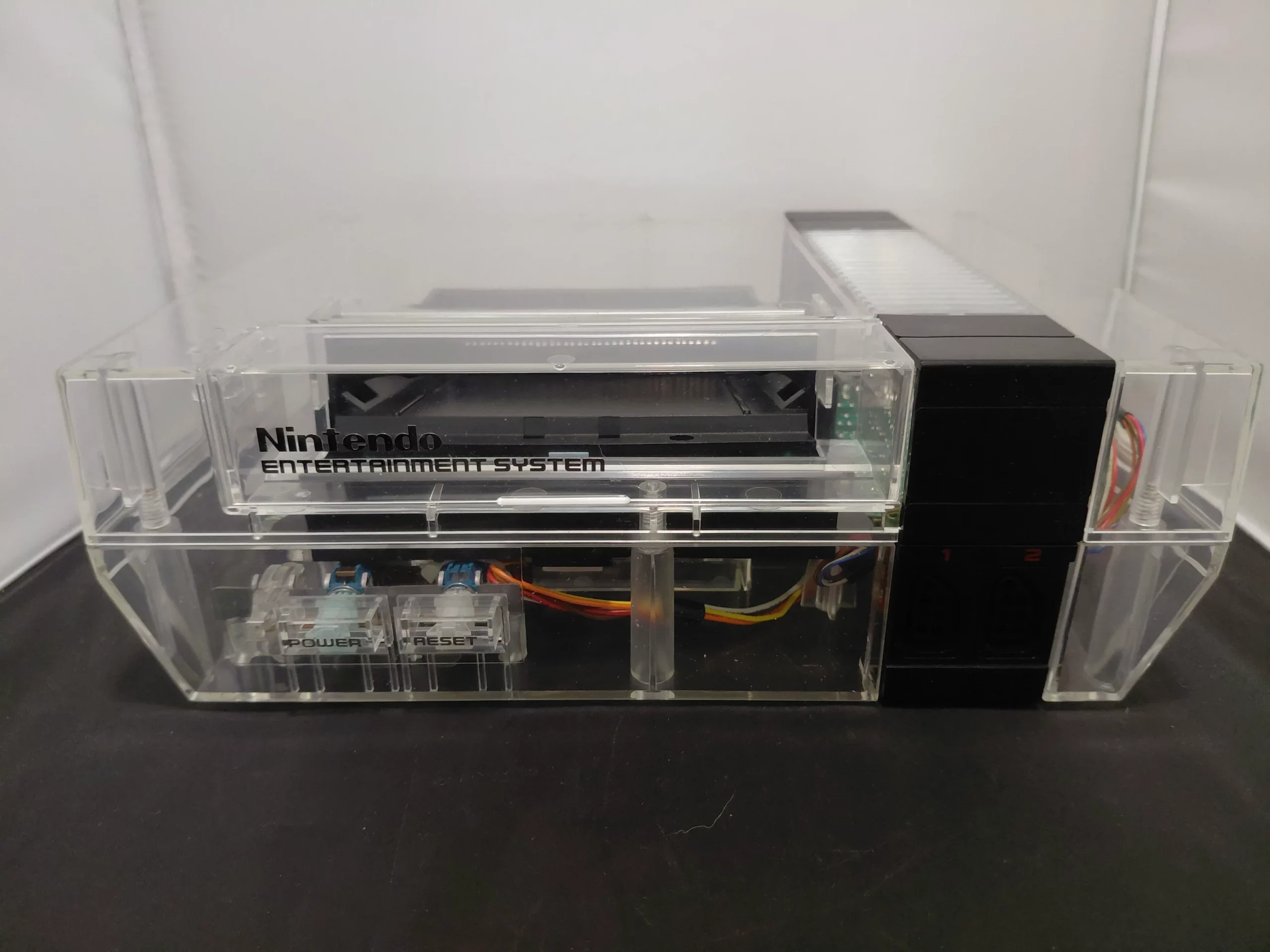 Nintendo NES (Console Only) (Refurbished) met Bitfunx Clear Shell - Afbeelding 8