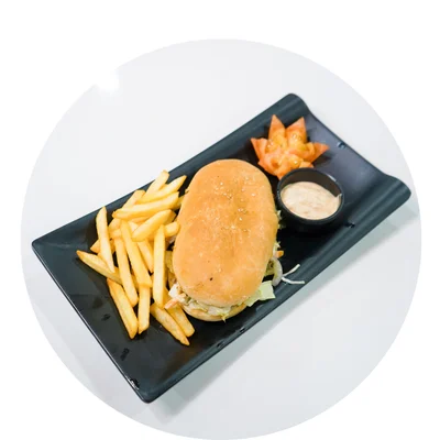 a sandwich and fries on a black plate