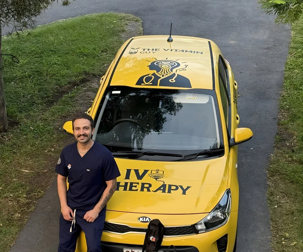 AHPRA-registered nurse delivering mobile IV therapy at a client's home &mdash; The Vitamin Guy, Brisbane and Gold Coast