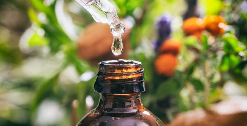 Variety of herbs and dropper for allergy treatment