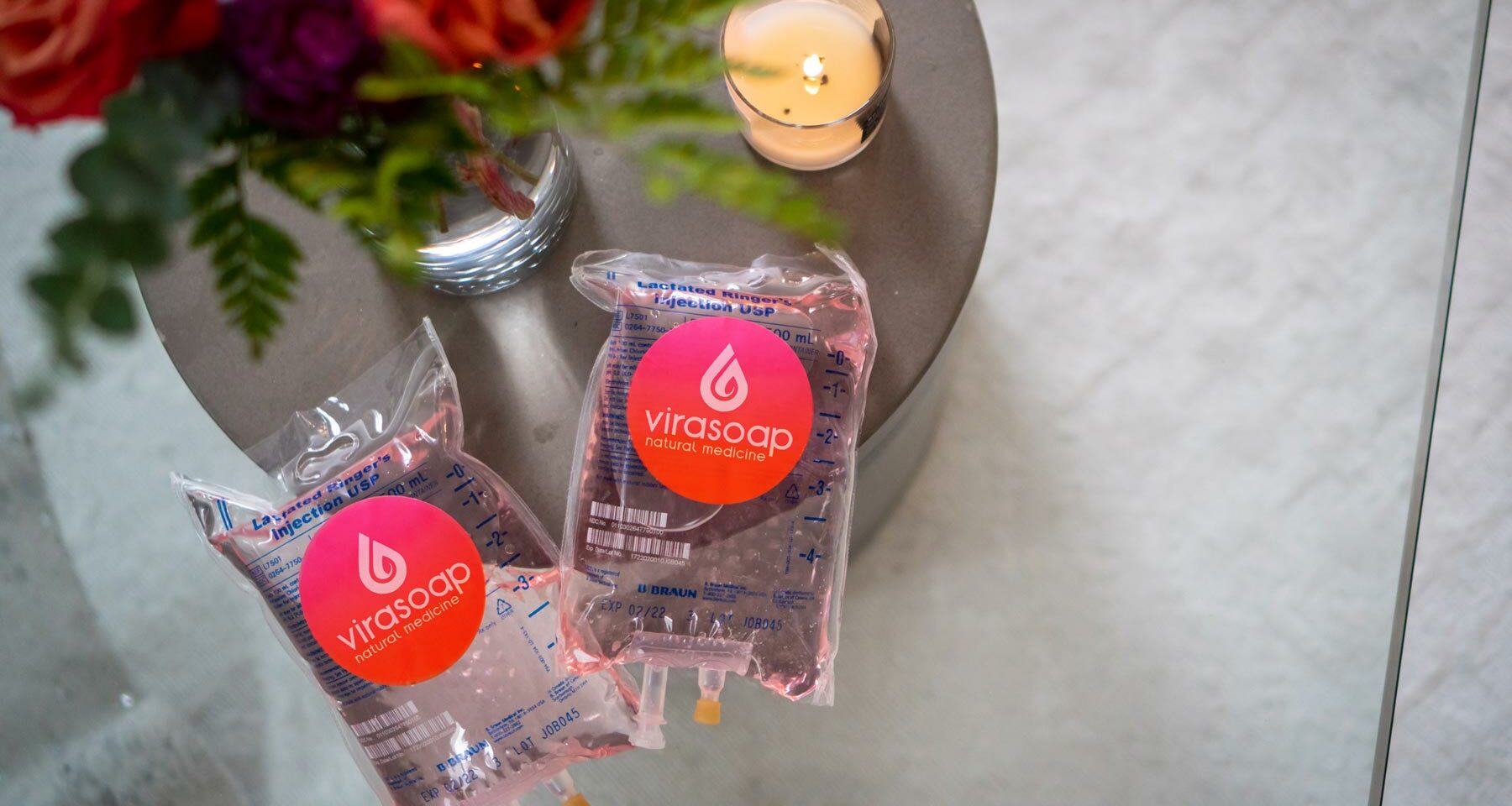 IV drip bags labeled "Virasoap Natural Medicine" for IV therapy treatment in Meridian, ID