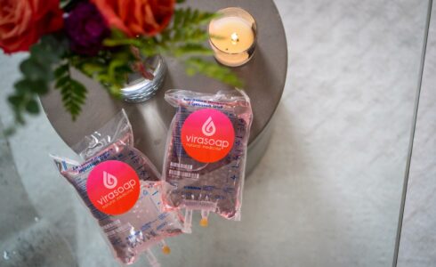 IV drip bags labeled "Virasoap Natural Medicine" for IV therapy treatment in Meridian, ID