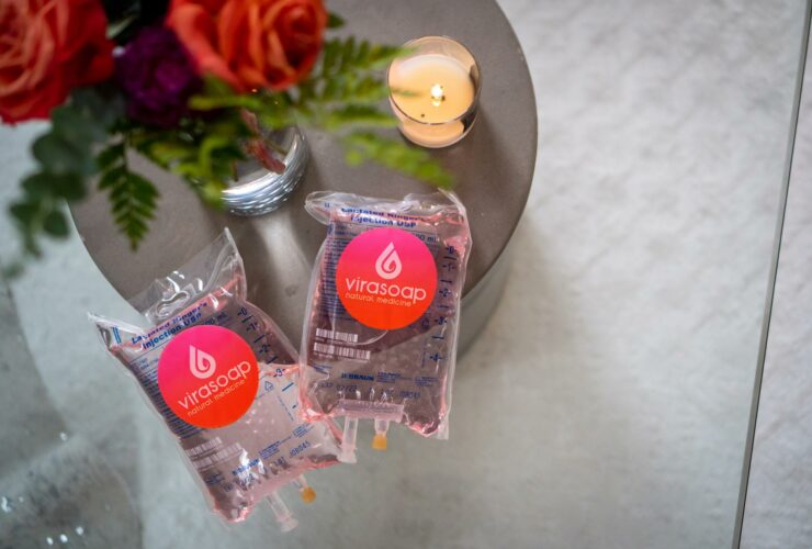 IV drip bags labeled "Virasoap Natural Medicine" for IV therapy treatment in Meridian, ID