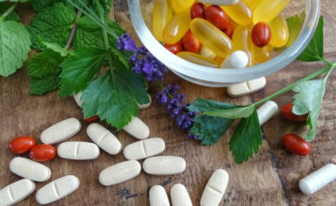 Bowl with multi vitamins, supplements, omega 3 capsules and pills in Meridian, Idaho