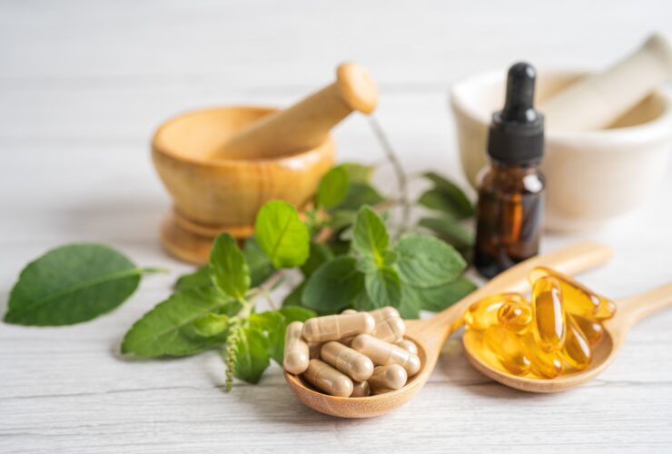 Alternative medicine herbal organic capsule drug with herbs leaf natural