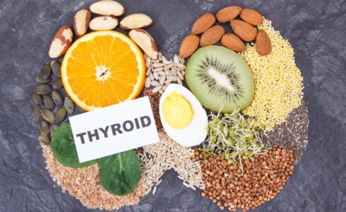 Nutritious ingredients in shape of thyroid. Healthy food containing vitamins.