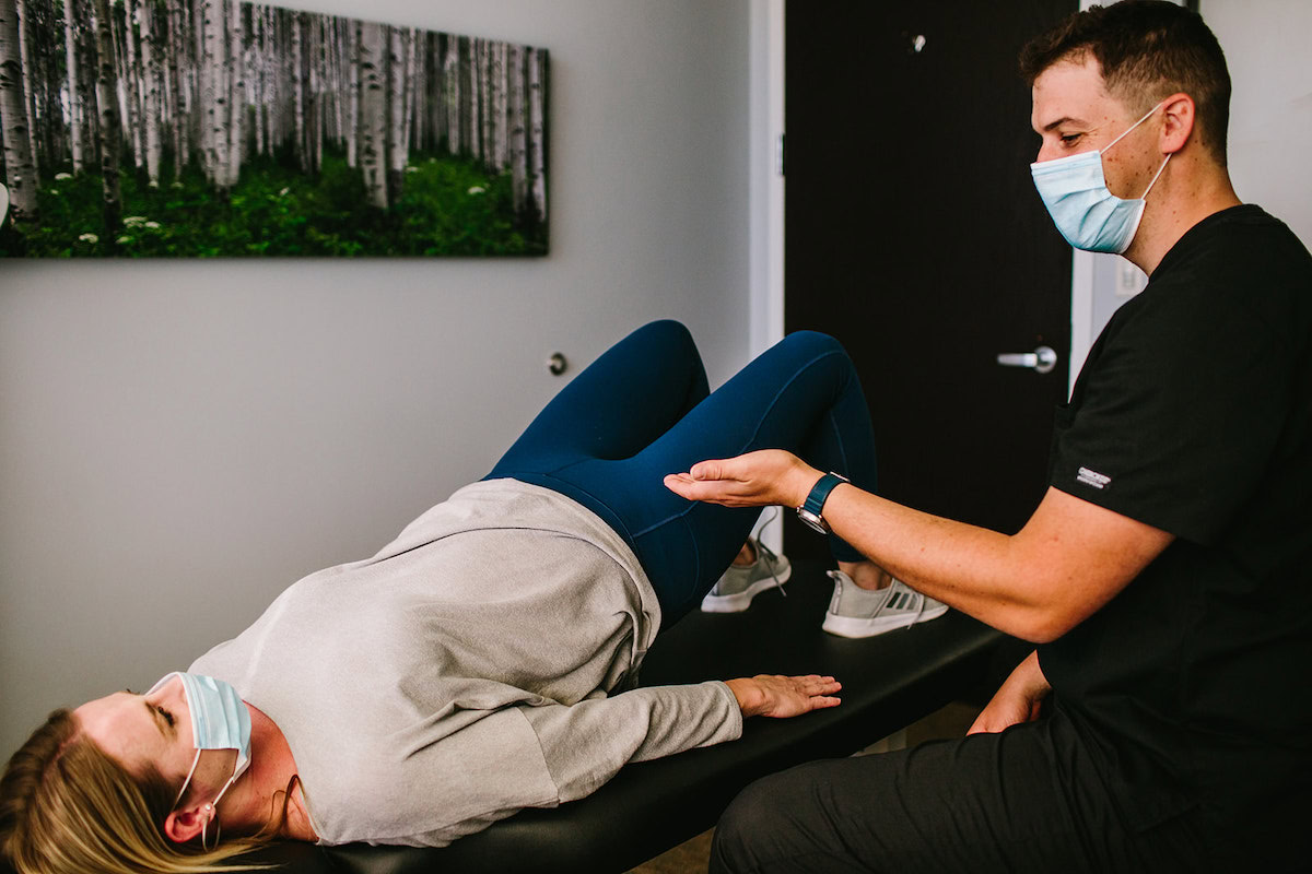 patient and therapy doing rehab therapy