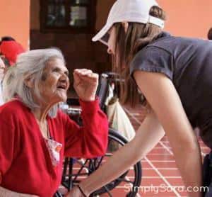 Sara McDaniel with Guatemalan elderly woman, a better life