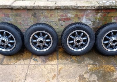 Set of 5 Minilite alloy wheels and tyres, just removed from my sebring sprite/mg as shown in the last two photos and replaced with wire wheels.