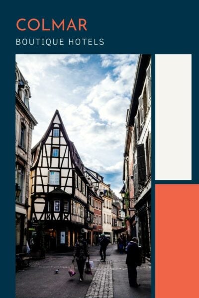 Half timbered houses on a cobblestone street in Colmar France.