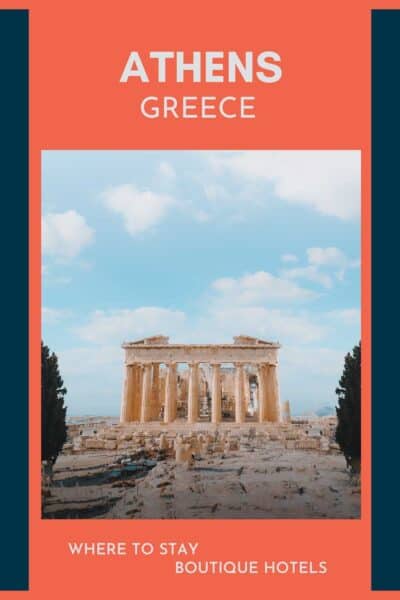 Acropolis in Athens, Greece during the day with a pale blue sky.