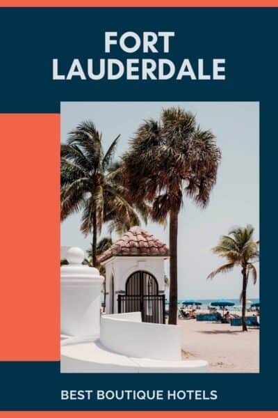 Fort Lauderdale Beach with palm trees and white washed buildings.