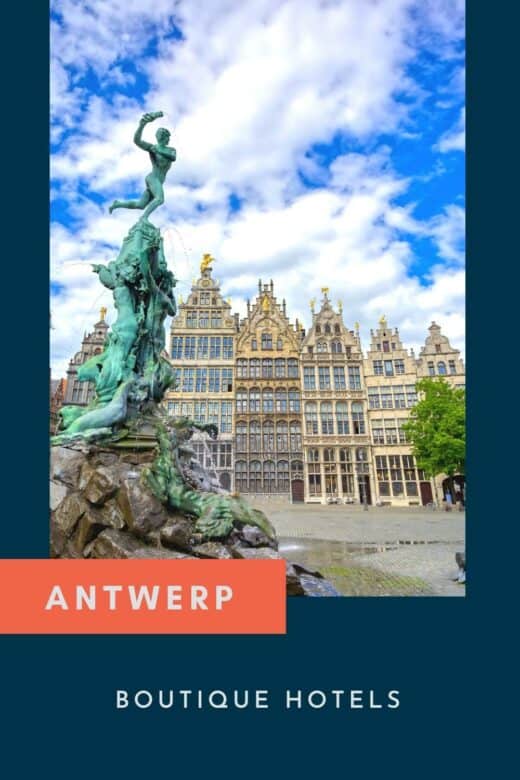 Antwerp statue in front of historic buildings.