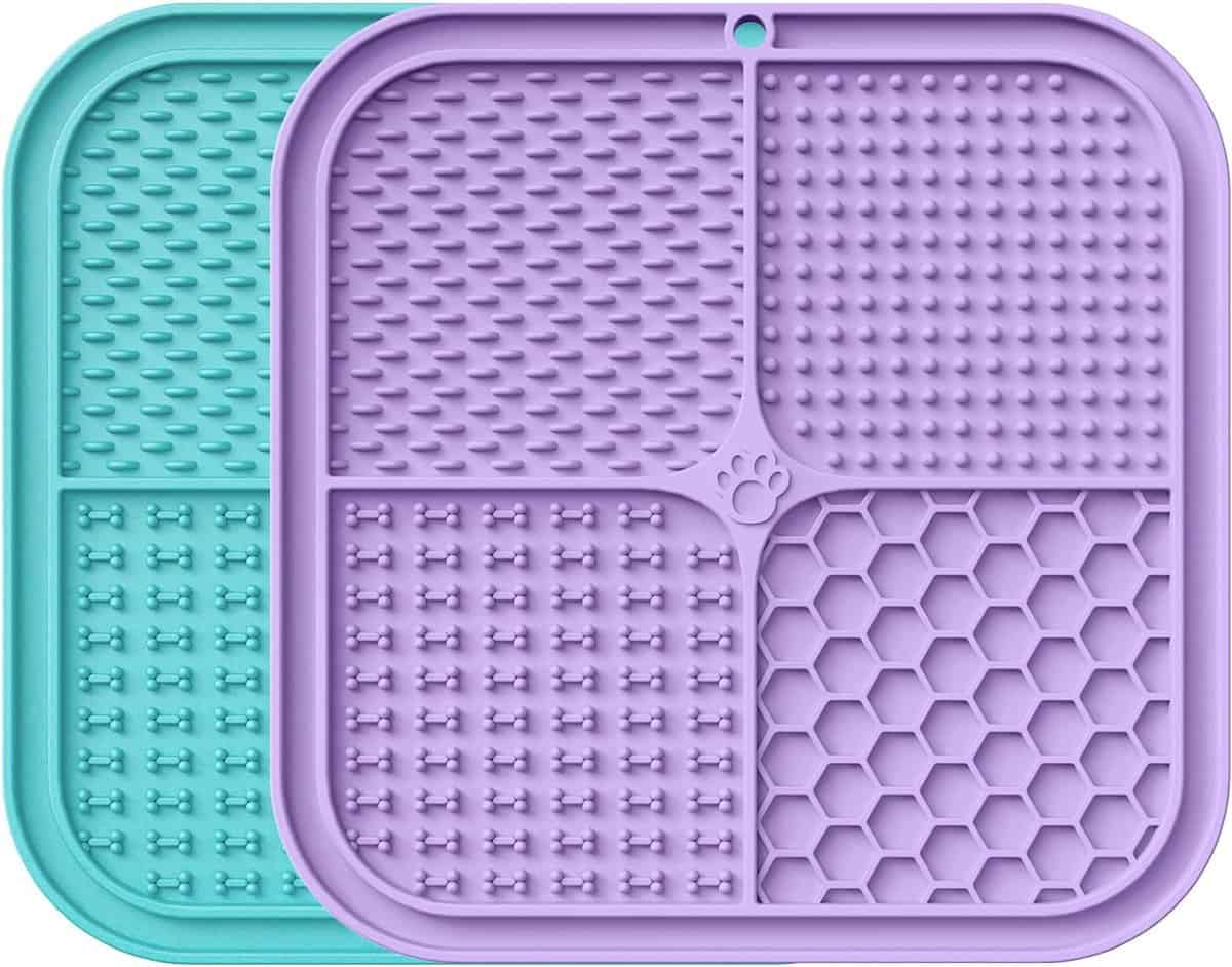 close up of two lick mats, blue and purple