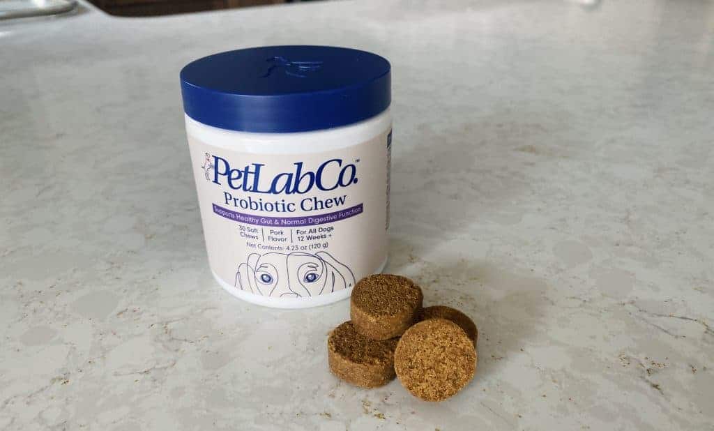 petlabco probiotic chews sitting next to tub on countertop