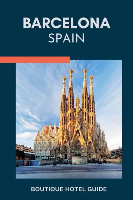 La Sagrada Familia from front on in beautiful soft light and wispy clouds.