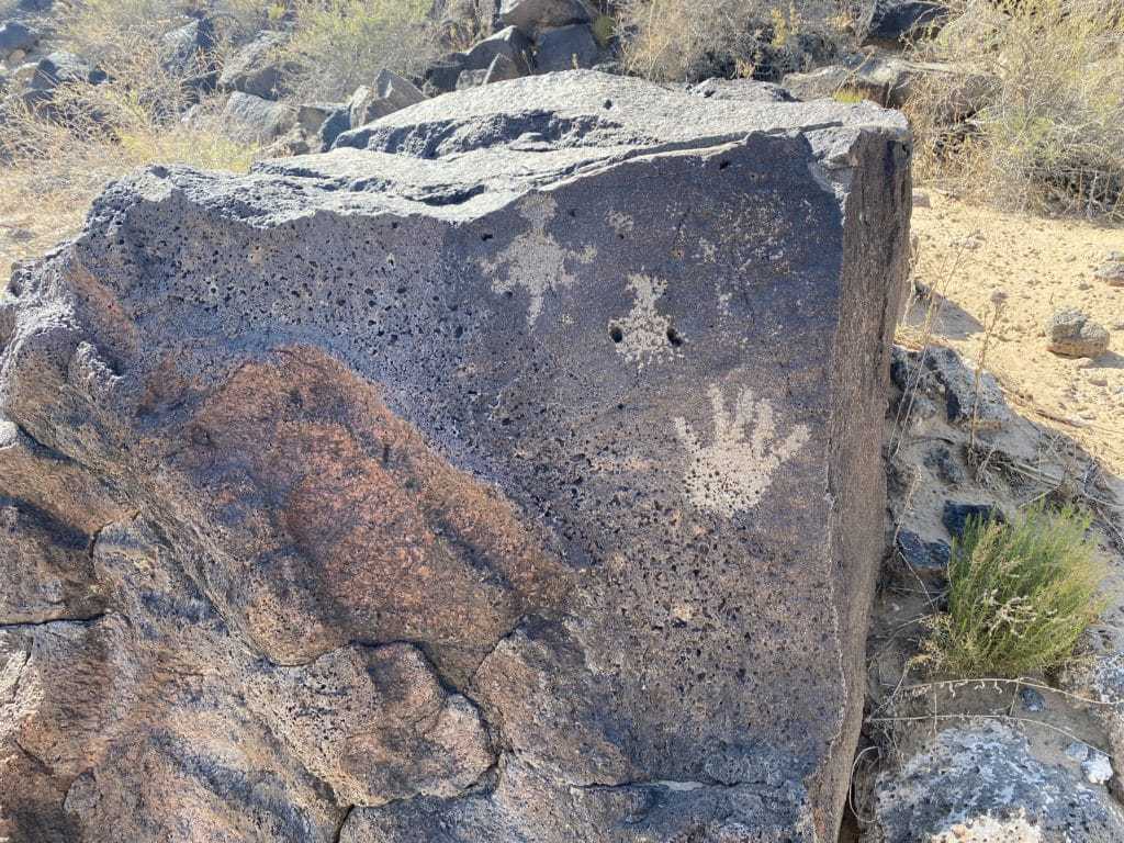Hands and animals of Petroglyth Piedras Marcadas Canyon Trail 