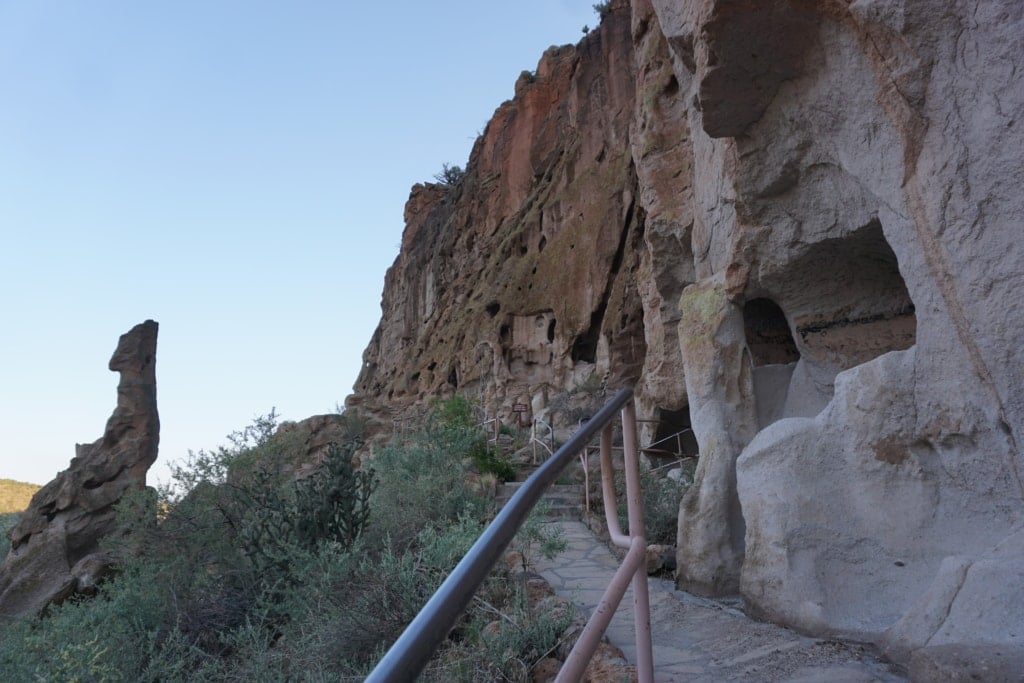 walking along the cliff dwellings of bandelier national monument
