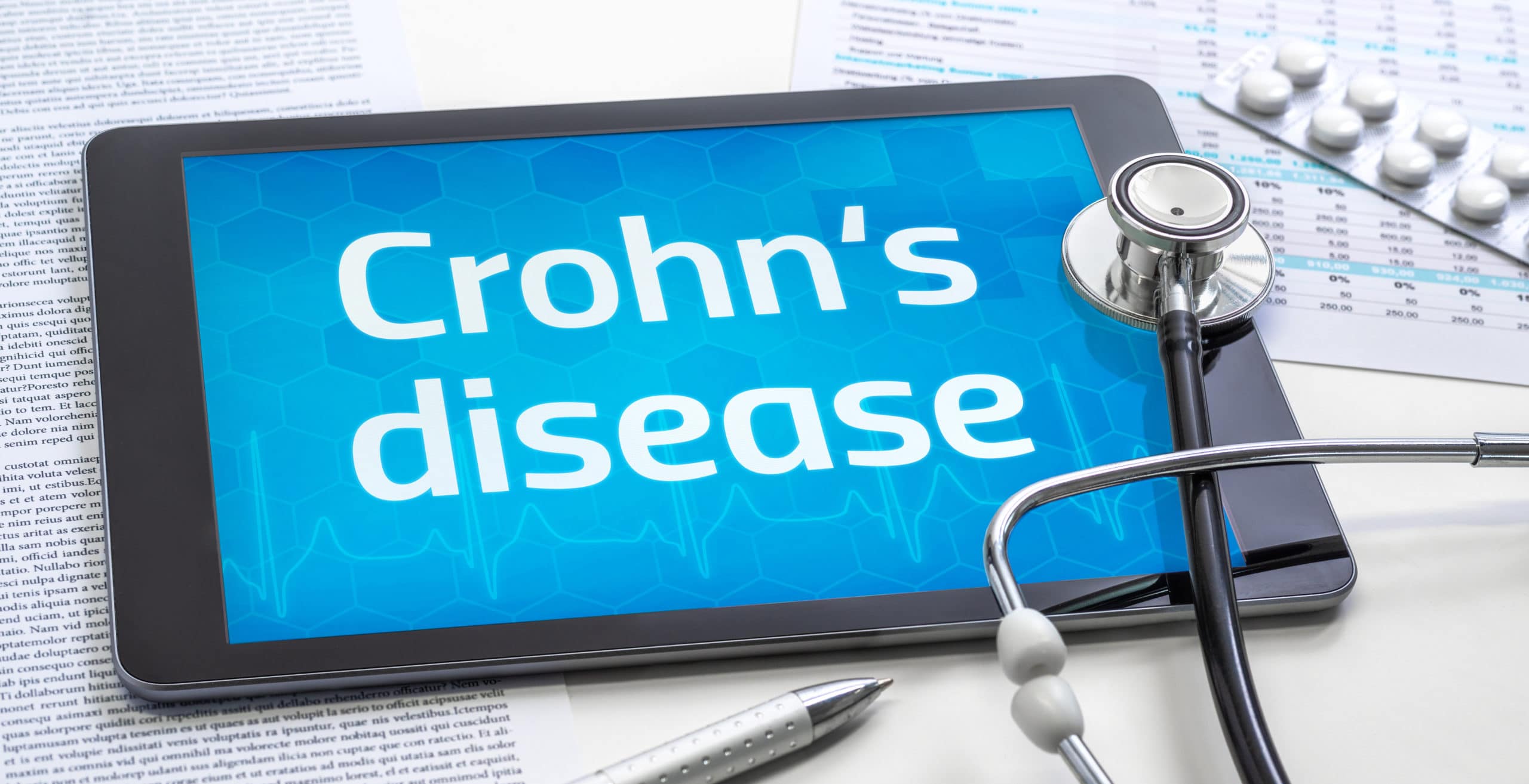 The word Crohn's disease on the display of a tablet