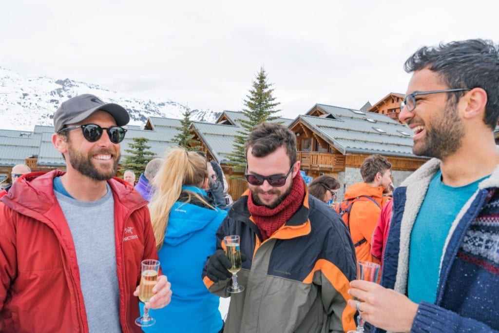 Guests enjoying a glass of champagne during their ski holiday