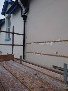 helical bar crack repair of wall prior to making good