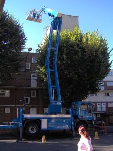 Using cherry picker to aid wall tie replacement