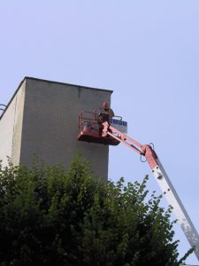 Using cherry picker to carry out structural repairs