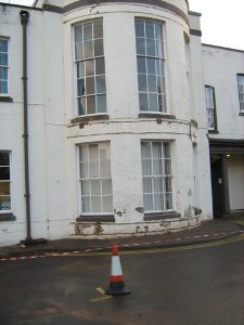 Structural repairs between floors of two story bay window