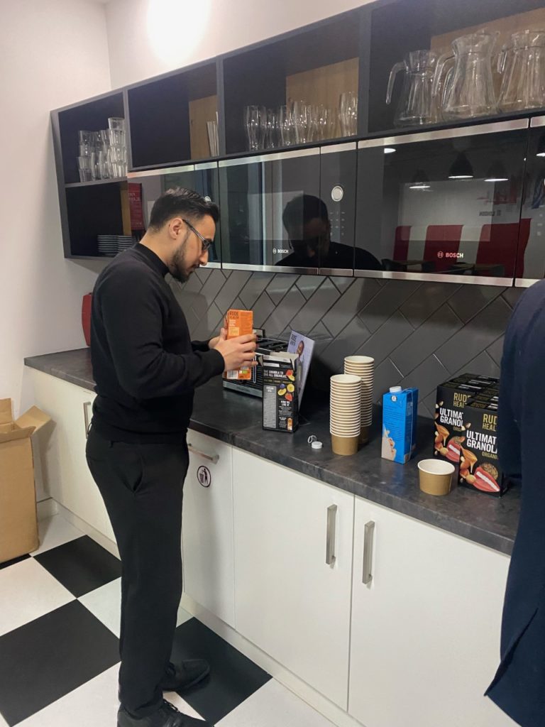 Rude Health with a consumer sampling the products in his office kitchen